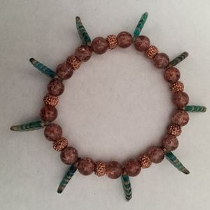 Hand Crafted Rose gold and crystal leaf spike beaded statement stretchy Bracelet